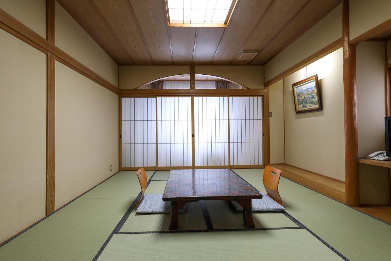 Tsukasaya Ryokan Tsuruoka Esterno foto